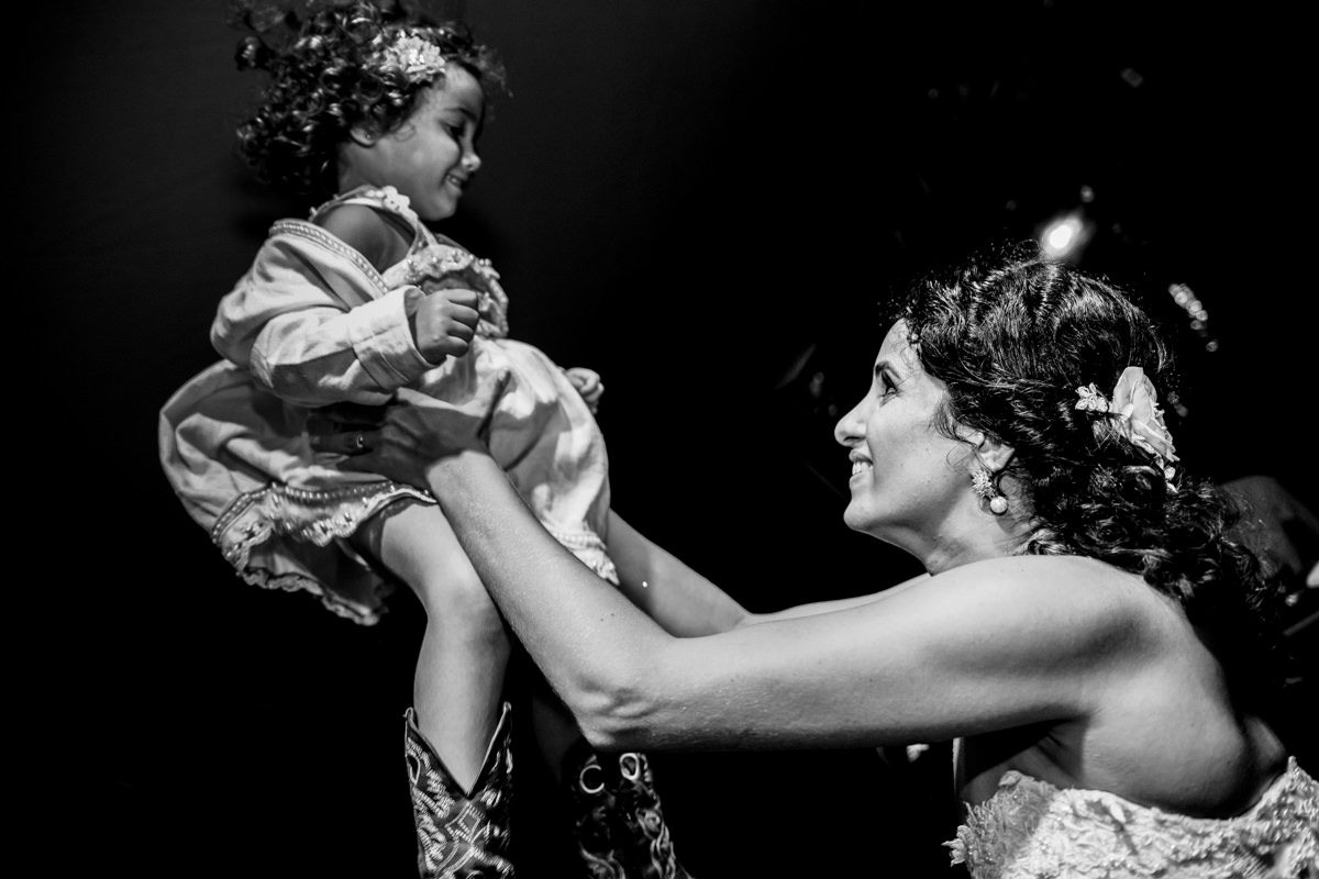 bride and kid sharing happiness