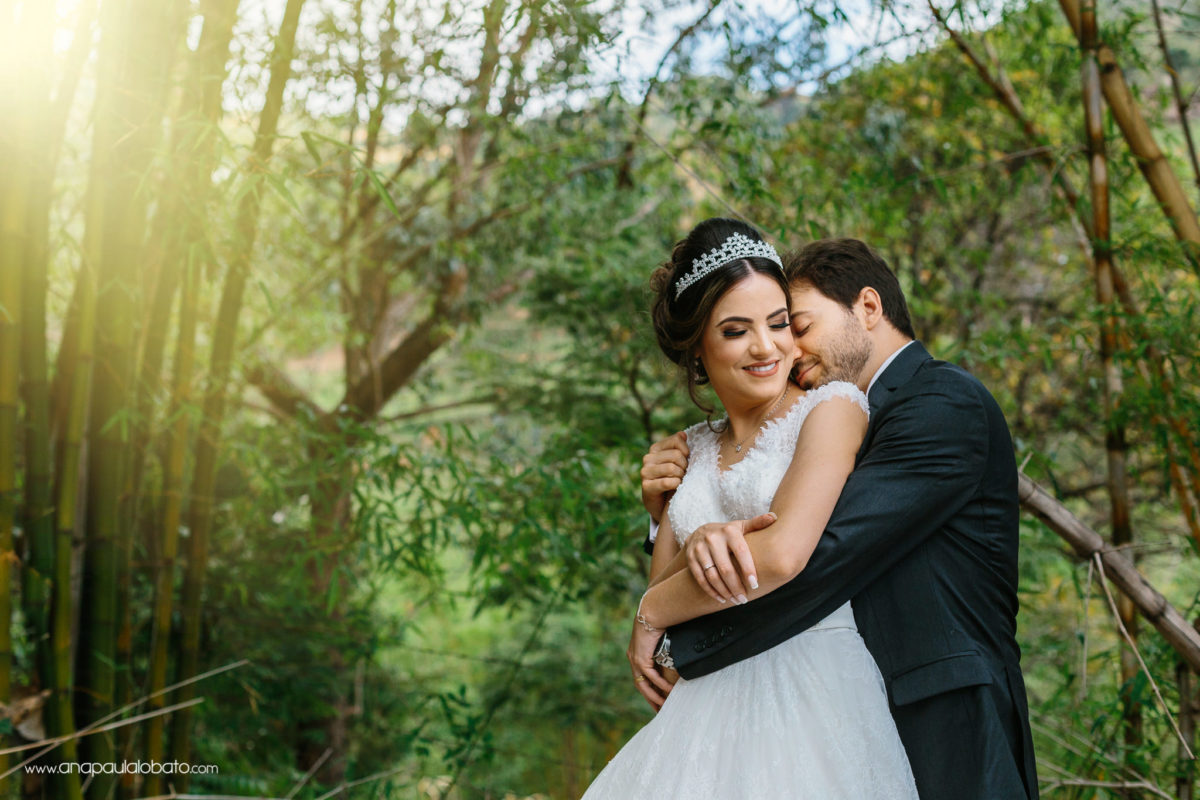 bride and groom hugging