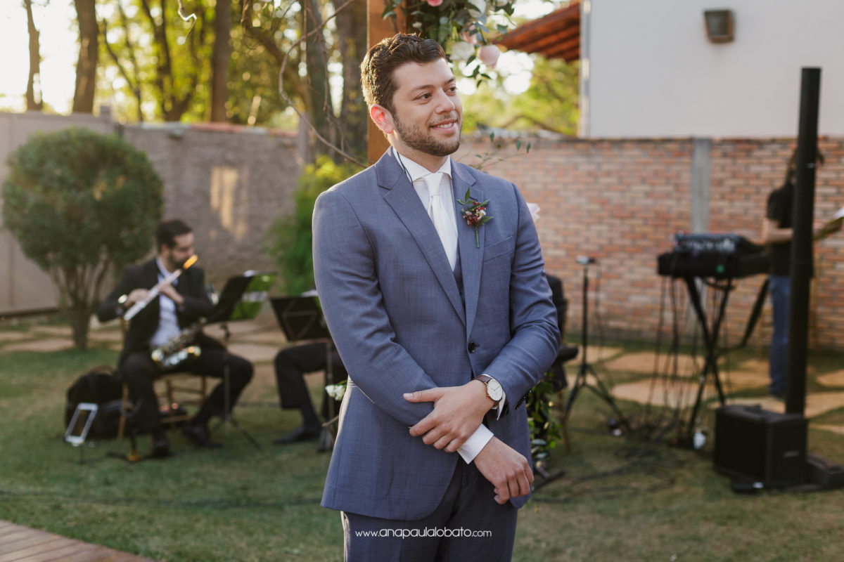 american groom waits for bride