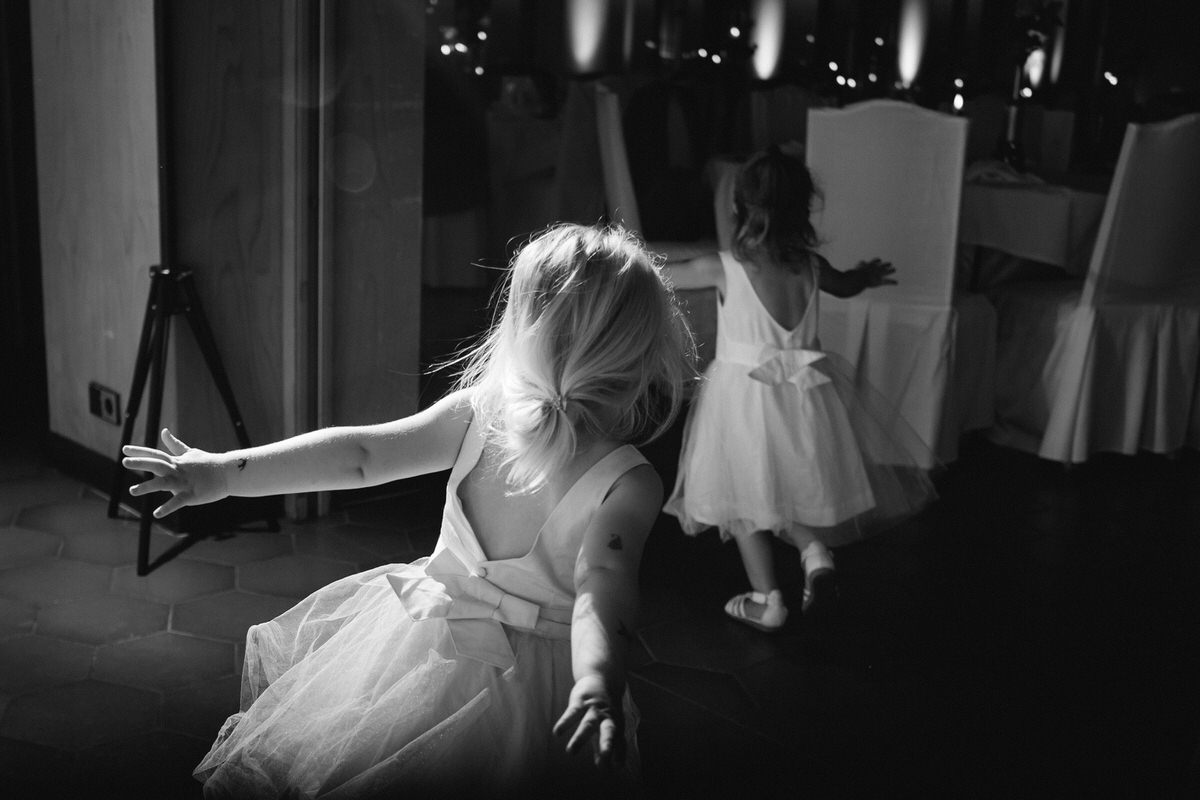 kids running at a wedding